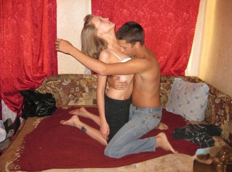 Young Girl And Her Boyfriend Get Each Other Naked Before Fucking On A Sofa Bed