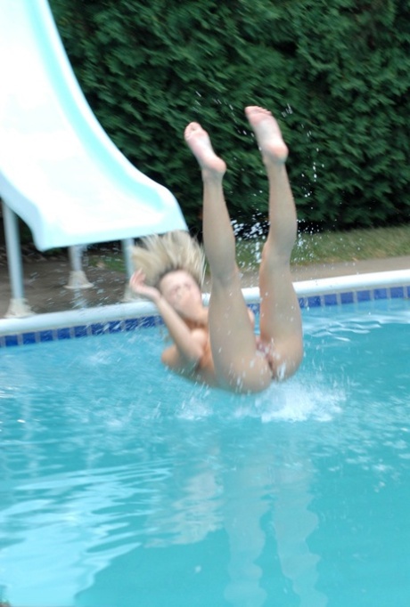 Kasia, a young woman with blonde hair, removes her bikini before being nudely plunged into the water.