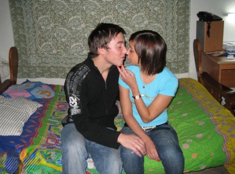 Horny teens kiss before undressing for a hard couples fuck on their shared bed