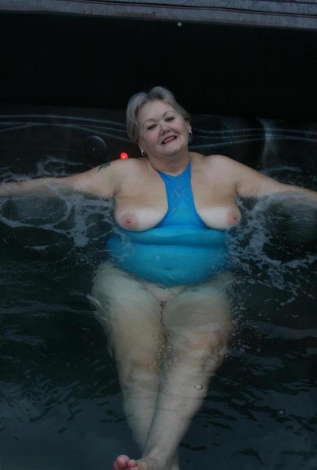 An outdoor hot tub is where Chubby nan Valgasmic Exposed can reveal her tits and pussy.
