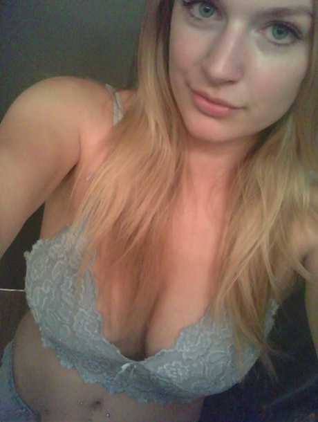 SFW style: Blonde amateur Danielle takes sexy selfies around her home.