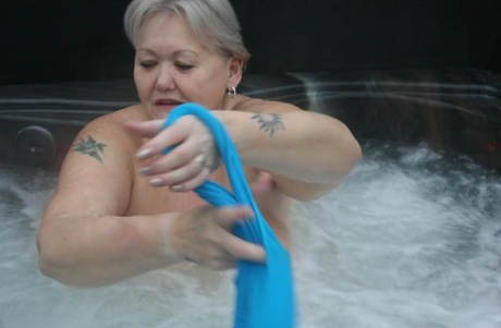 Old Woman Valgasmic Exposed Plays With Her Breasts While Hot Tubbing