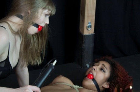 Dolly Leigh And Daisy Ducati Have Interracial Lesbian Sex While Ball Gagged