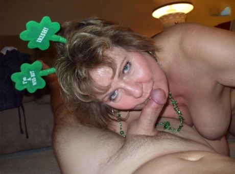 Mature amateur Busty Bliss sucks a small dick during St Paddy celebrations