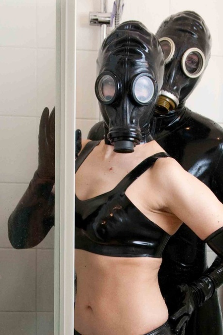 Amateur Chick Jana Puff And A Lesbian Model Gas Masks And Latex In A Bathroom