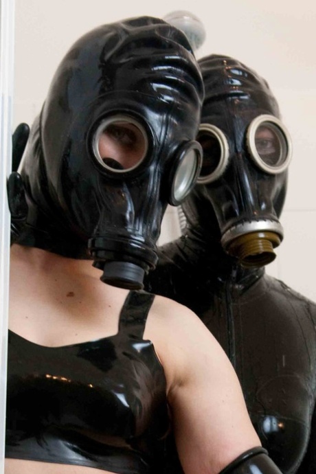 Amateur Chick Jana Puff And A Lesbian Model Gas Masks And Latex In A Bathroom