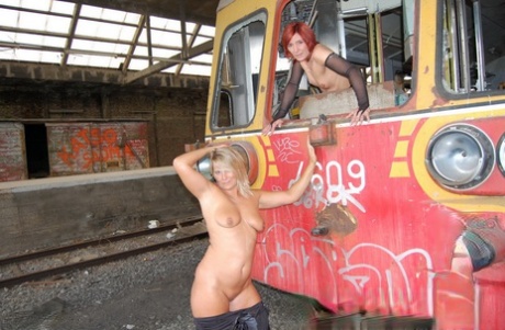 At one point, sweet Susi appears unclothed as she stands before a rail car while her friend observes.