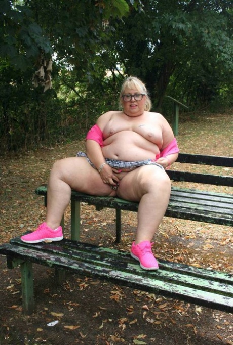 Self-imposed: Obesessed British amateur Lexie Cummings poses for pictures on a public picnic table.