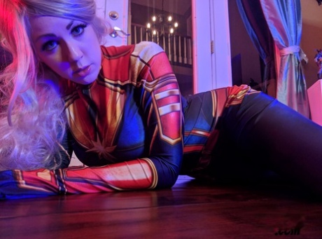 Blonde amateur, Kayla Kiss strips off in a costume of superheroes.
