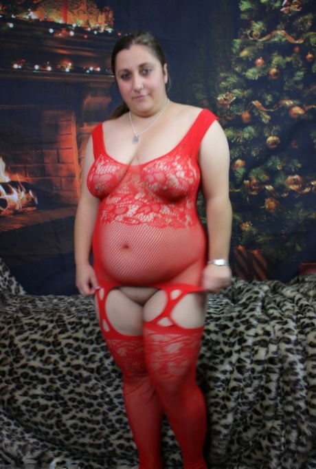 BBW Kimberly Scott, who is known for her role as a brunette, releases her pussy and tits from red lingerie.