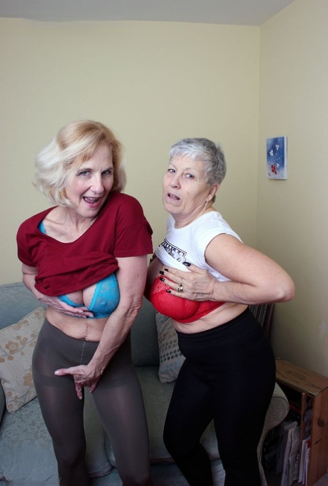 Old Lesbians Suck On Each Others Boobs After Modeling Fully Clothed