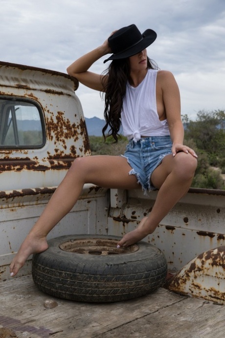 Hot centerfold model Carmen Nikole goes topless in a thong beside a wreck #3