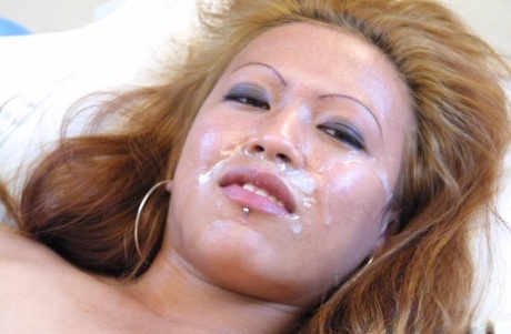 Asian Redhead Charisma Licks Her Lips After A Big Facial Cumshot