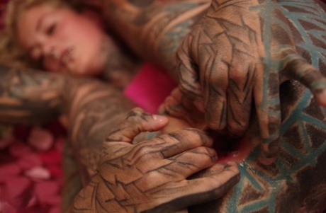 This is how a heavily tattooed woman puts her fingers in that asshole, stretching out like an angelic dream.