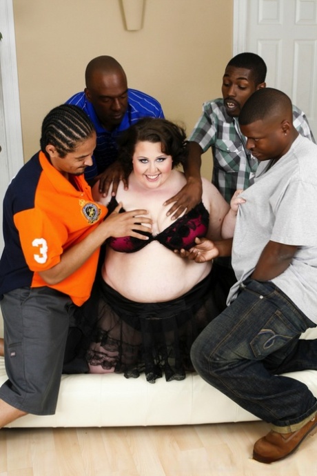 A bunch of black studs endanger an unidentified woman who is obese and white.