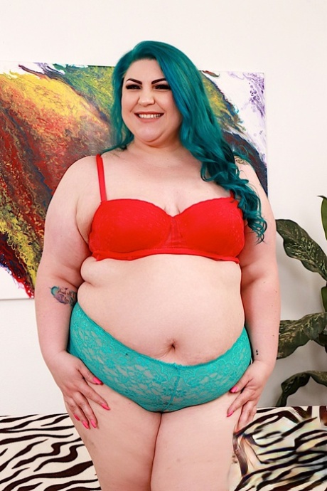 Long hair: Obese woman Bella Bendz is pictured naked in heels while wearing her long dyed hair.