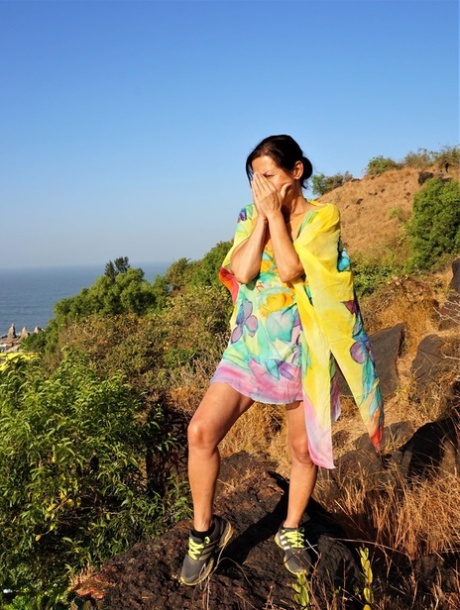 Older Lady Diana Ananta Exposes Herself During A Hike To A Shrine Atop A Cliff