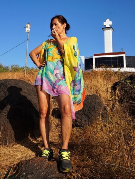 Older Lady Diana Ananta Exposes Herself During A Hike To A Shrine Atop A Cliff