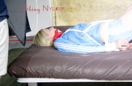 A sofa with ropes and a cloth gage is where HOT HOT HOT PIA is being tied and gagged.