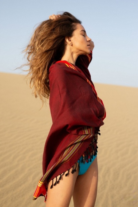 Centerfold Model Rose Whitney Displays Her Thin Body On A Sand Dune