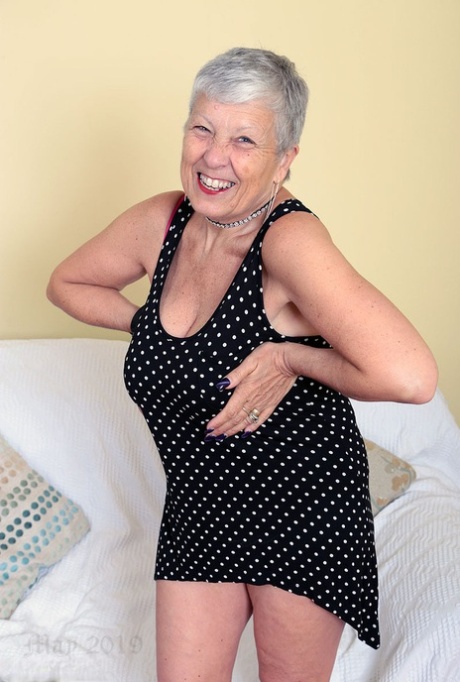 Sexy Granny Savana Flashes Upskirt Underwear Before Unleashing Her Large Boobs