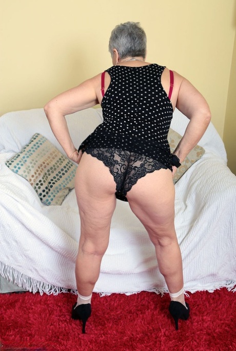 Sexy Granny Savana Flashes Upskirt Underwear Before Unleashing Her Large Boobs