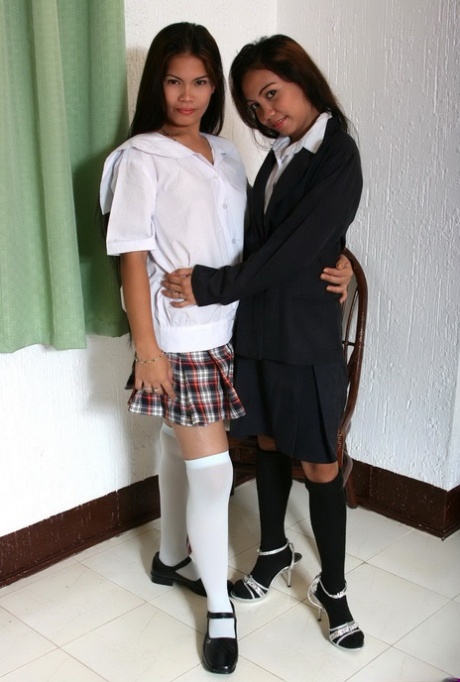 Asian Schoolgirls Share A Lesbian Kiss As They Strip To Over The Knee Socks