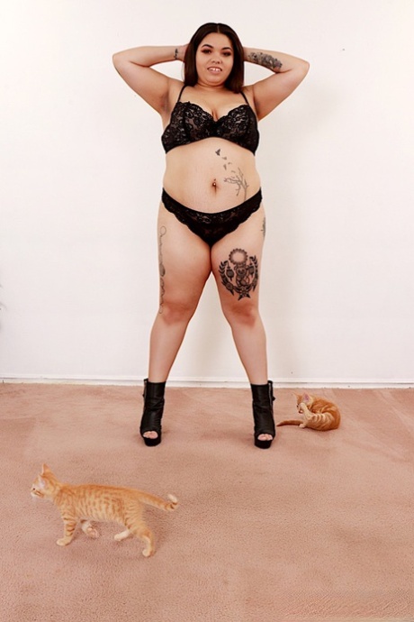 Despite her seductive charms, BBW displays her attractive breasts and pussy in a naked manner.