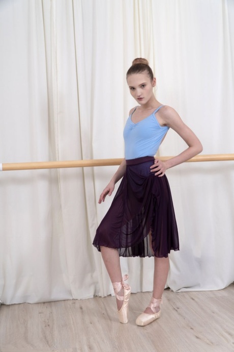 Teen Ballerina Olivia Frees Her Supple Body Of Dancing Attire At The Bar