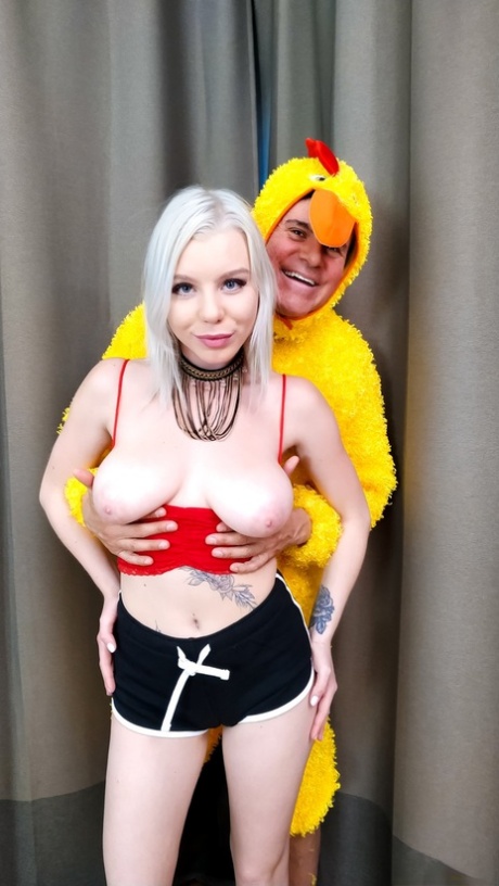 Platinum blond Mary Monroe gives her filthy asshole to a man in a chicken suit