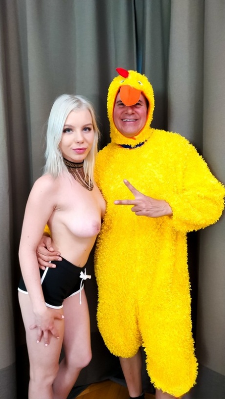 Platinum blond Mary Monroe gives her filthy asshole to a man in a chicken suit