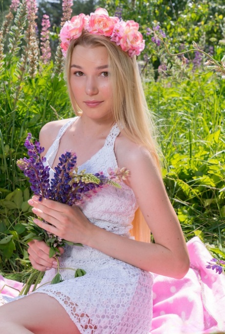 Young Blonde Wears A Crown Of Flowers During Her Nude Debut Amid Fireweed