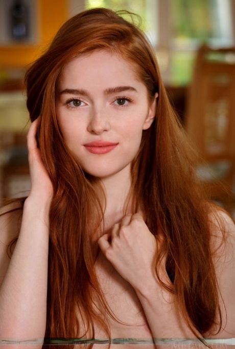 Natural redhead Jia Lissa flexes her supple teen body during nude solo poses