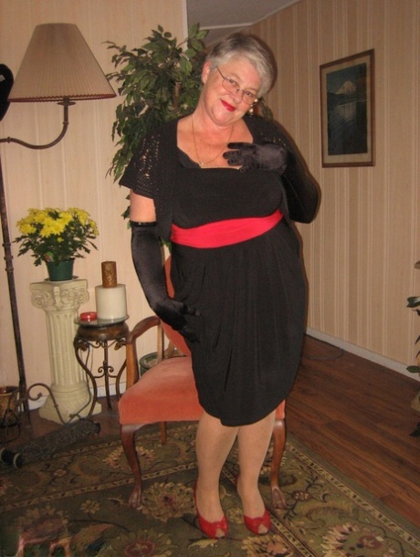 Old fatty Girdle Goddess fondles and saggy tits covered in black velvet gloves and hose.