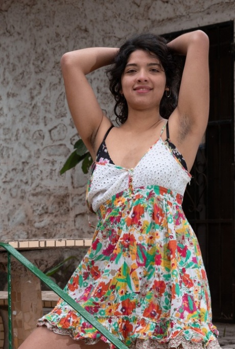 Chubby amateur Maria F displays her hair pits and then spreads her bush outdoors.