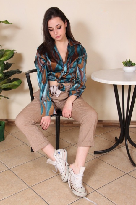 Fully Clothed Brunette Ilaria Frees Her Beautiful Feet From Canvas Sneakers