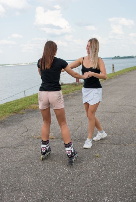 Teen girls have lesbian sex during a rolllerblading expedition near the water