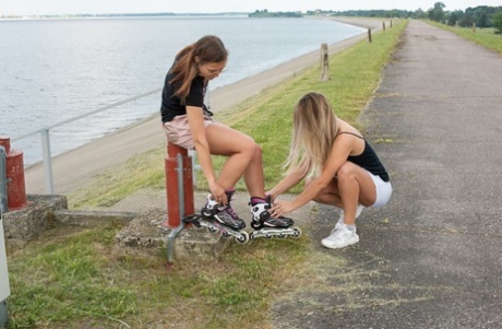 Teen girls have lesbian sex during a rolllerblading expedition near the water