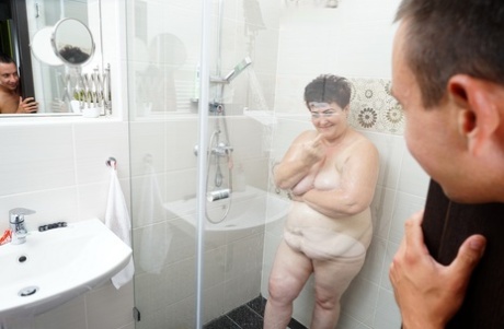 BBW, who is now six years old, is caught in the shower before engaging in sexual activity with her younger partner.