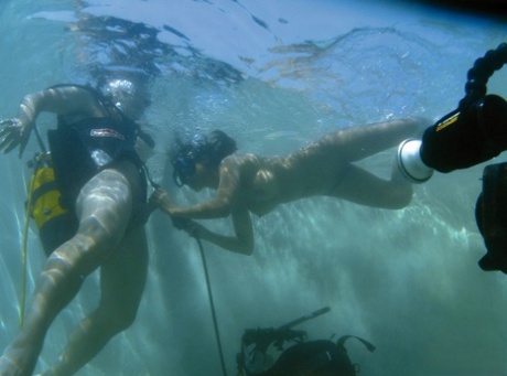 Asian chick dons scuba gear to suck cock and have sex underwater