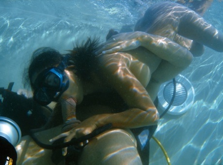 Asian chick dons scuba gear to suck cock and have sex underwater