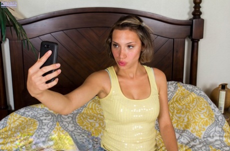 Amber Faye, a Latina performer, takes a selfie before her first nude gig.