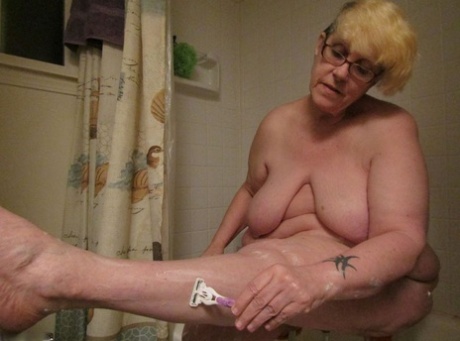 Fat Granny Bunny Gram Shaves Her Legs On The Side Of Her Bathtub