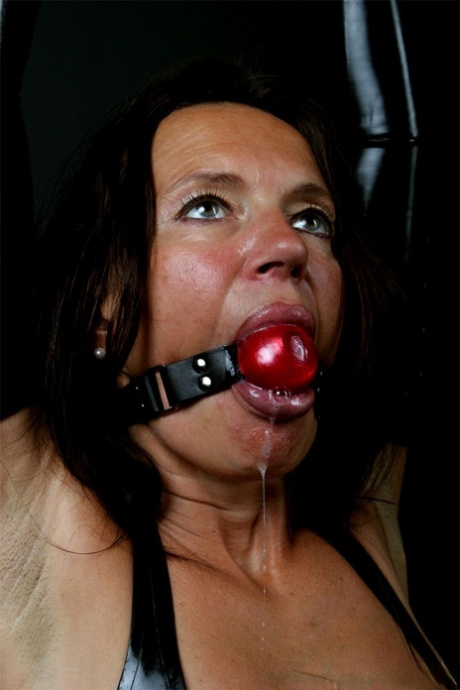 Restrained Brunette Drools While Ball Gagged And Popping Out Anal Beads