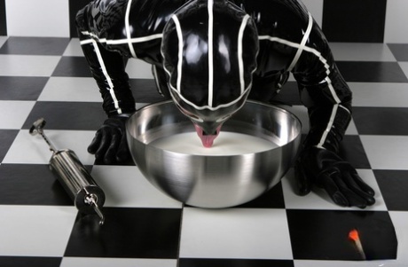 Solo Girl Squirts Milk From Her Asshole While Wearing A Latex Catsuit