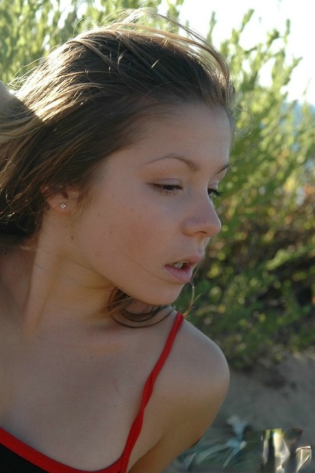 18-year-old Girl Unleashes Her Tiny Tits While At The Beach
