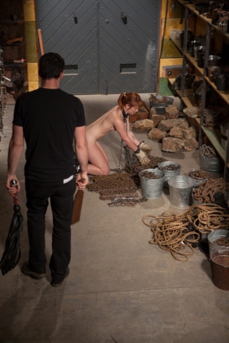 The natural redhead grotesquely grimaces in pain during the use of their sex slave position.