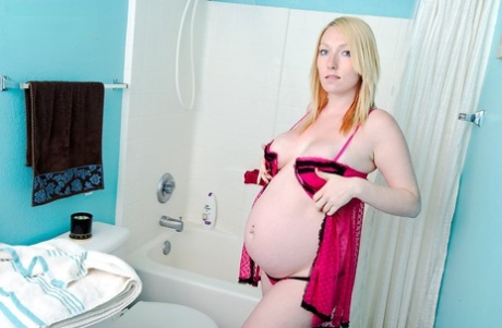 Solo Girl Shows Her Heavily Pregnant Belly While Taking A Shower