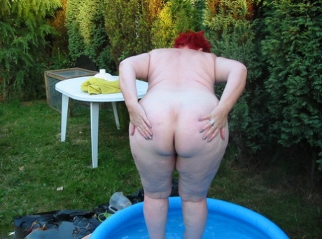 Redheaded BBW Valgasmic Exposed, who is older than him and has never been happier, enjoys playing in the pool with his dilly.