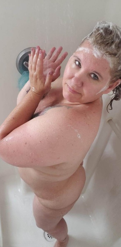 Mature BBW Kris Ann Removes A Dress Before Taking A Shower In The Nude